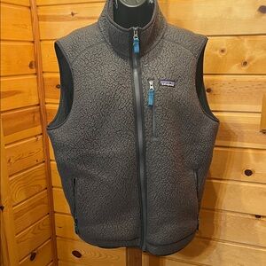 Patagonia Charcoal Fleece Vest with Teal Trim and Multicolor Logo